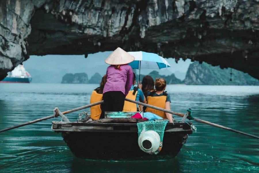 bamboo boat rowing by local people