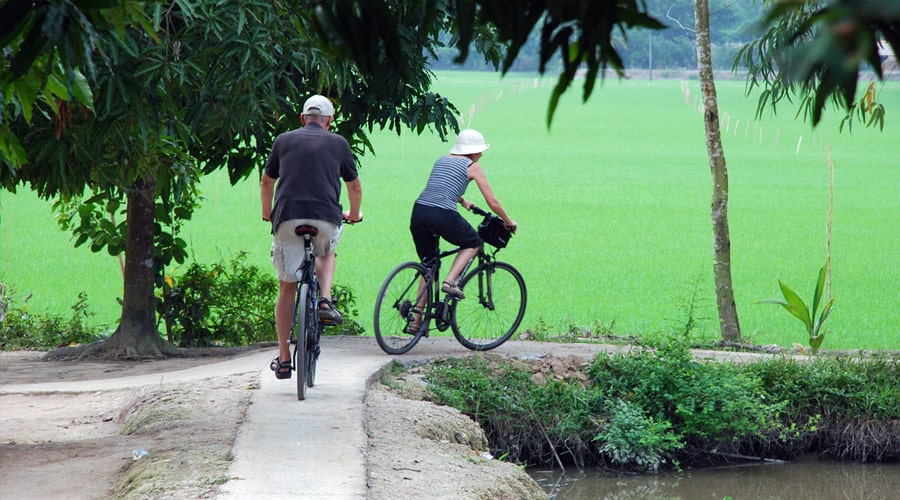 cycling in small village in Mekong delta